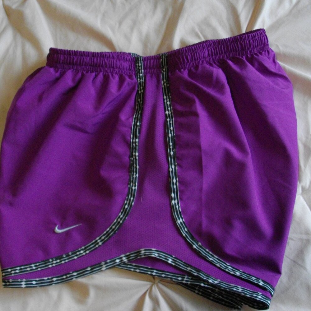 Nike Women's Dri-Fit running shorts, purple with black/white trim. Small.